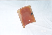 Showing a cross-section of a molding bag that was created by an isostatic press mold.