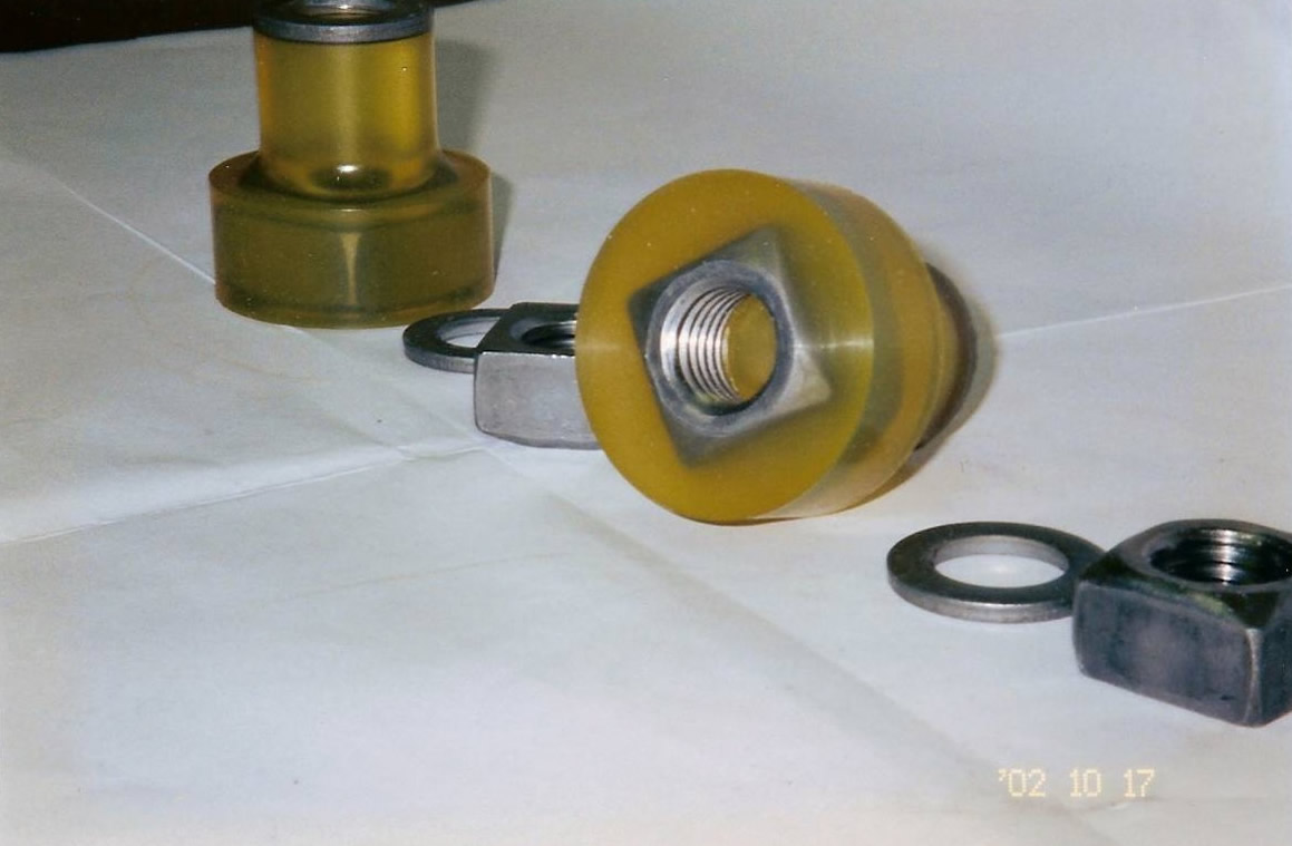 Urethane applied to the outer part of a metal bolt.